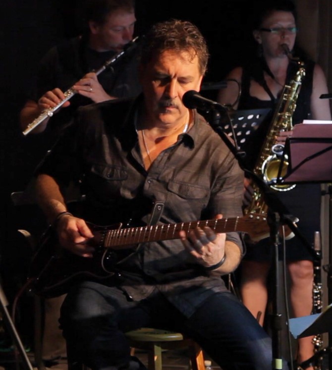 David Glabais guitar lessons Toronto — Studio 211 instructor on stage