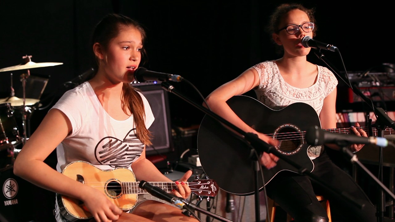 Guitar lessons Toronto — Studio 211 students Marikje and Quinn live