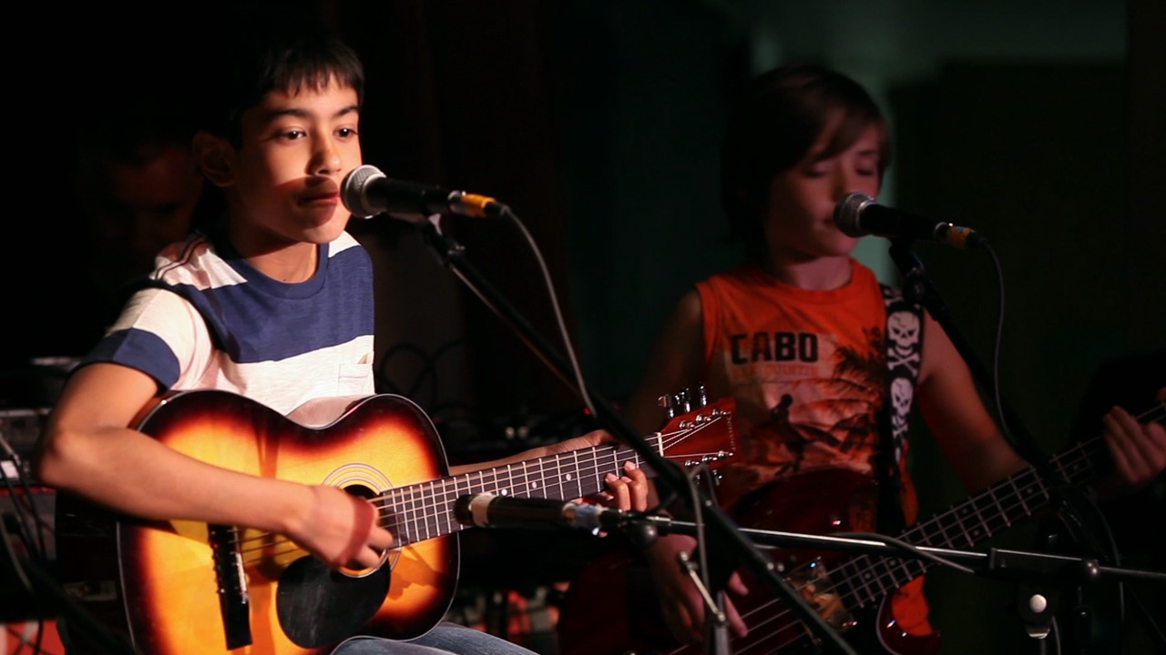 Guitar lessons Toronto — Studio 211 students Rohan and Rebecca live